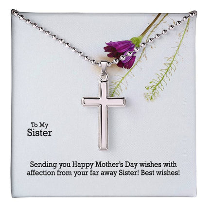 Polished stainless steel cross necklace with ball chain displayed in a luxury gift box with a To My Sister Sending Happy Mother's Day Wishes message card and purple wildflower background.