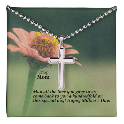 Polished stainless steel cross necklace with ball chain displayed in a luxury gift box with a To My Mom May All the Love You Gave Come Back Hundredfold Happy Mother's Day message card and pink zinnia flower background.