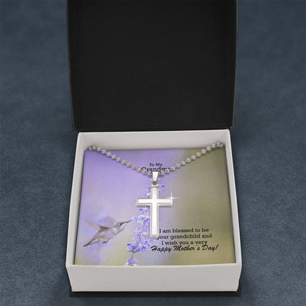 Polished stainless steel cross necklace with ball chain displayed in a luxury gift box with a To My Grandma I Am Blessed to Be Your Grandchild Happy Mother's Day message card and hummingbird lavender background.