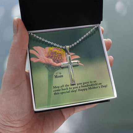Polished stainless steel cross necklace with ball chain displayed in a luxury gift box with a To My Mom May All the Love You Gave Come Back Hundredfold Happy Mother's Day message card and pink zinnia flower background.
