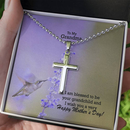 Polished stainless steel cross necklace with ball chain displayed in a luxury gift box with a To My Grandma I Am Blessed to Be Your Grandchild Happy Mother's Day message card and hummingbird lavender background.