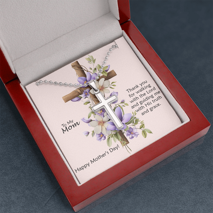 Polished stainless steel cross necklace with ball chain displayed in a mahogany luxury gift box with a To My Mom Thank You for Walking With the Lord Happy Mother's Day message card and purple floral cross background.