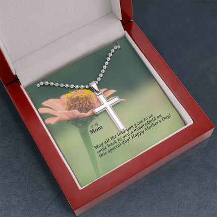 Polished stainless steel cross necklace with ball chain displayed in a luxury gift box with a To My Mom May All the Love You Gave Come Back Hundredfold Happy Mother's Day message card and pink zinnia flower background.