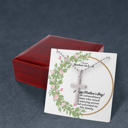 Polished stainless steel cross necklace with ball chain displayed in a luxury gift box with a Dearest Mother-in-Law Happy Mother's Day message card and watercolor floral wreath background.