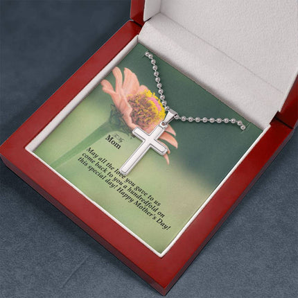 Polished stainless steel cross necklace with ball chain displayed in a luxury gift box with a To My Mom May All the Love You Gave Come Back Hundredfold Happy Mother's Day message card and pink zinnia flower background.