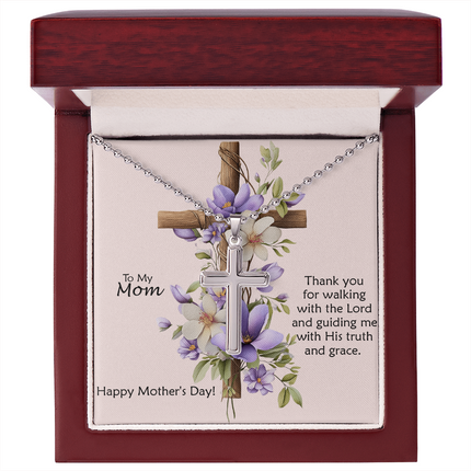 Polished stainless steel cross necklace with ball chain displayed in a mahogany luxury gift box with a To My Mom Thank You for Walking With the Lord Happy Mother's Day message card and purple floral cross background.