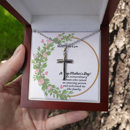 Polished stainless steel cross necklace with ball chain displayed in a luxury gift box with a Dearest Mother-in-Law Happy Mother's Day message card and watercolor floral wreath background.