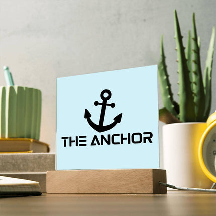 The anchor acrylic square plaque with black anchor icon on light blue background – LED desk decor sign