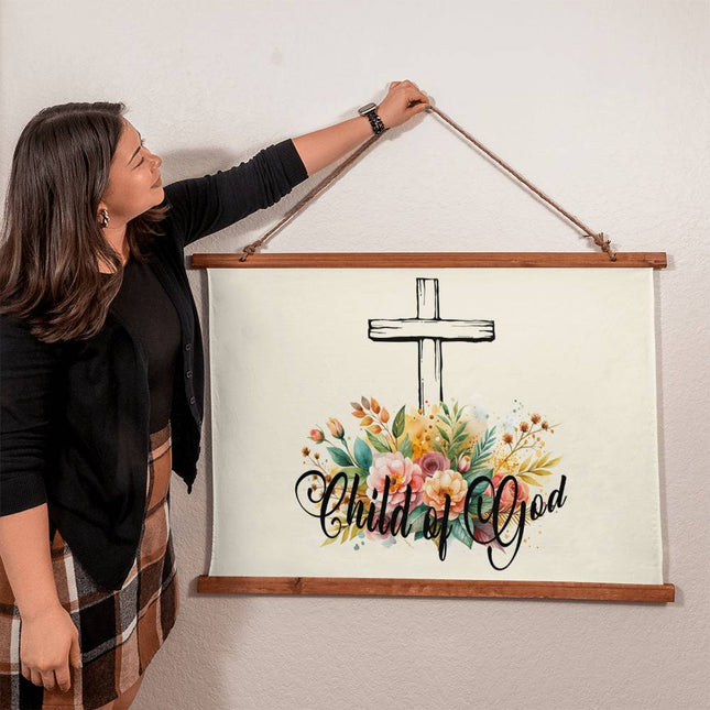 Child of God wood framed wall tapestry with cross and floral bouquet on cream background – 36x26 horizontal Christian wall decor