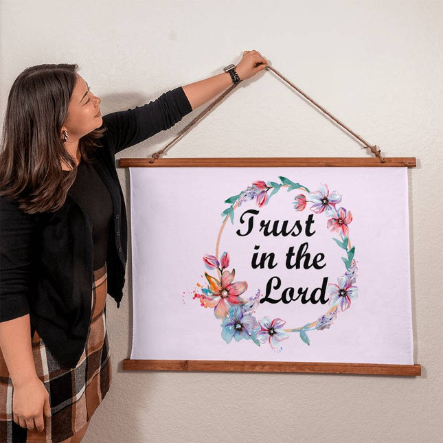Trust in the Lord wood framed wall tapestry with floral wreath on light lavender background – 36x26 horizontal Christian wall decor