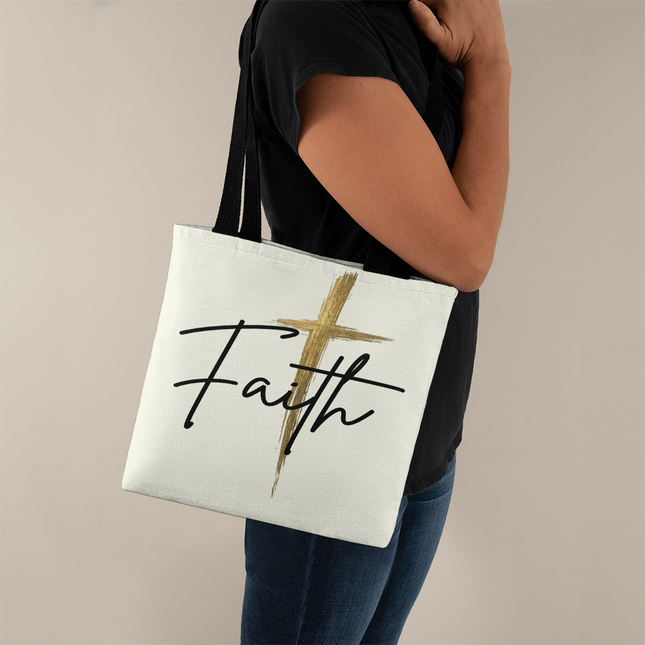 Faith cross gold Christian tote bag with black handles, classic everyday carryall for church, Bible study, and errands