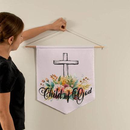 Child of God wall pennant with cross and watercolor floral bouquet on light blush background – 21x18 Christian wall decor