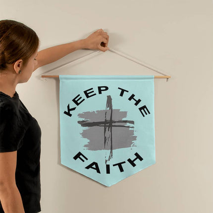 Keep the faith wall pennant with black lettering and cross graphic on light blue background – 21x18 Christian wall decor