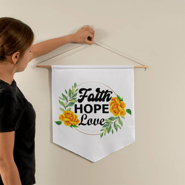 Faith hope love wall pennant with yellow roses and green leaves in a circular frame on white background – 21x18 Christian wall decor