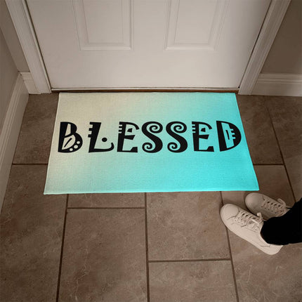 Blessed welcome mat with decorative black lettering on cream to teal gradient background – faith home decor doormat