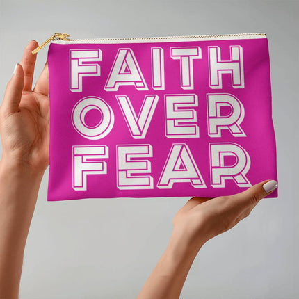 Faith over fear large fabric zippered pouch with outlined white block lettering on magenta background – Christian accessory bag for Bible study supplies