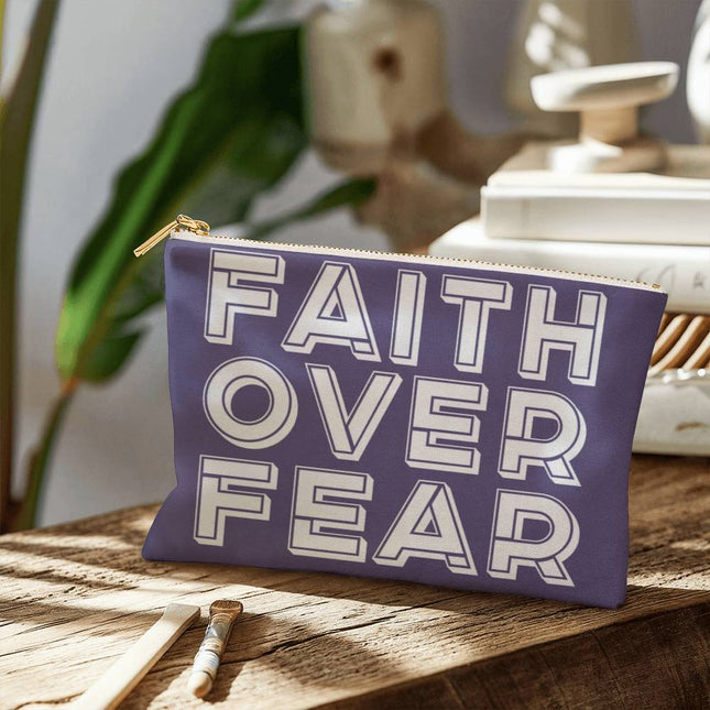 Faith over fear small fabric zippered pouch in deep purple with outlined block lettering – Christian accessory bag
