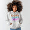 White Christian hoodie with good news only text in retro multicolor lettering – unisex faith hooded sweatshirt