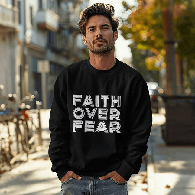 Black Christian crewneck sweatshirt with faith over fear text in bold white block lettering – unisex faith sweatshirt