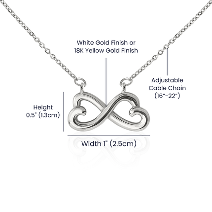 Heart-shaped infinity endless love necklace in white gold finish held in hands, displayed in a gift box with a To My Friend Happy Mother's Day message card and moody teal sunset background.