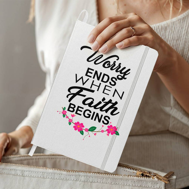 White ambassador bound journal with “Worry ends when faith begins” black typography and pink floral accents – Christian prayer journal notebook