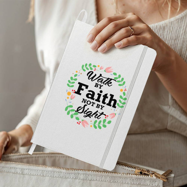 White ambassador bound journal with “Walk by Faith Not by Sight” typography inside a floral wreath – Christian prayer journal notebook