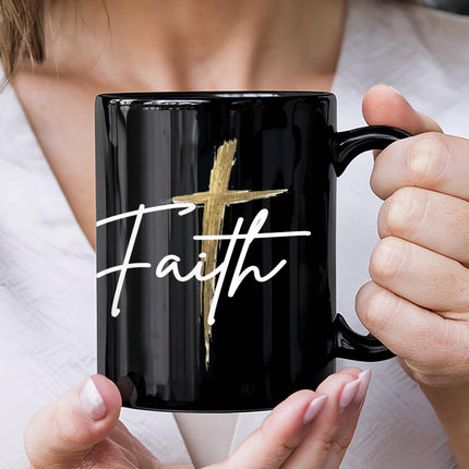Black Christian coffee mug with “Faith” lettering and gold cross design, available in 11oz or 15oz