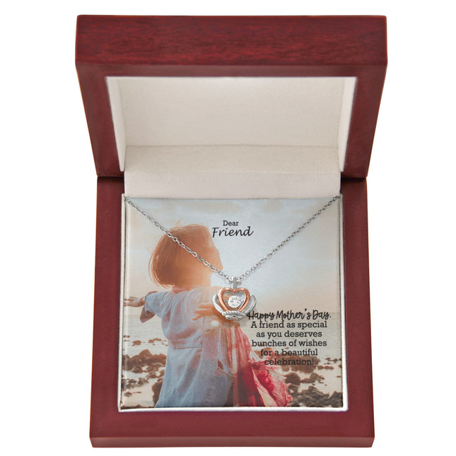 Sterling silver and rose gold crown pendant necklace with a sparkling cubic zirconia center, displayed in a mahogany luxury LED gift box with a Dear Friend Happy Mother's Day message card.